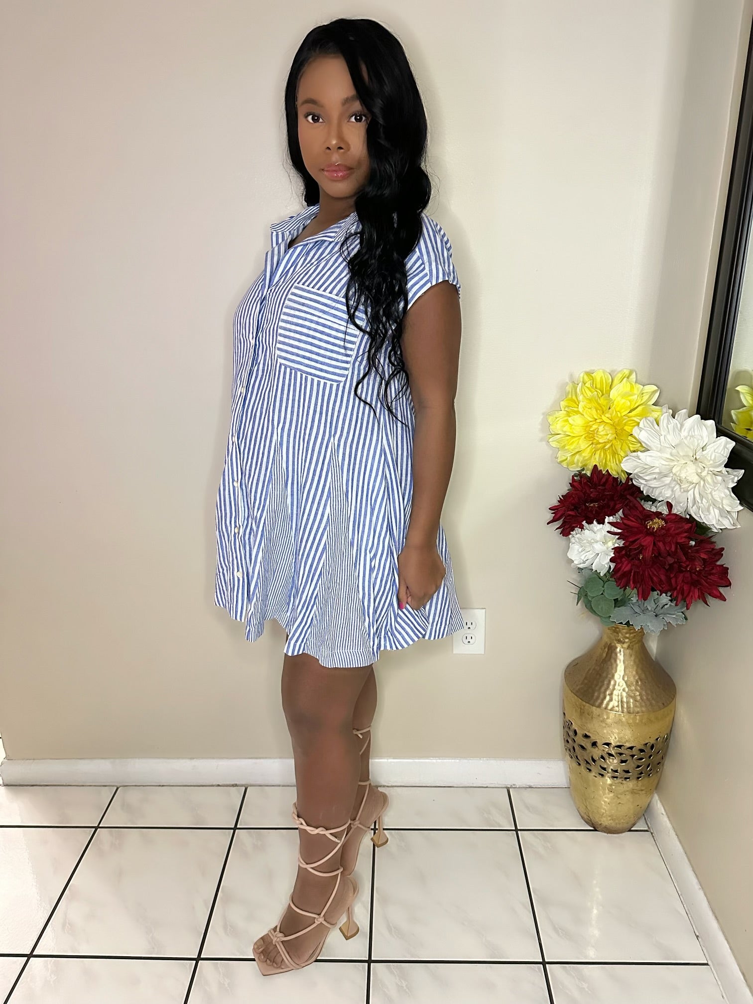 Trendy striped t-shirt dress styled for women’s casual fashion