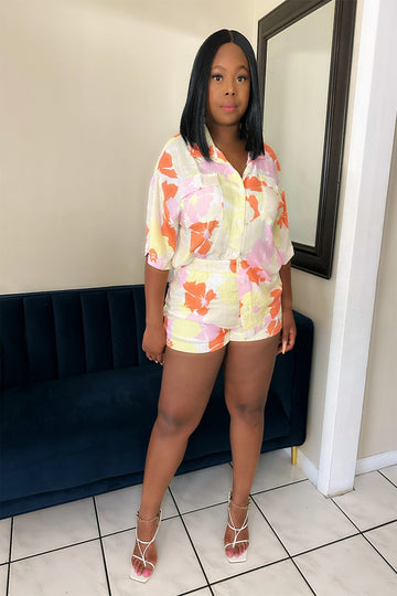 Bold crop top and shorts set styled for street-style fashion